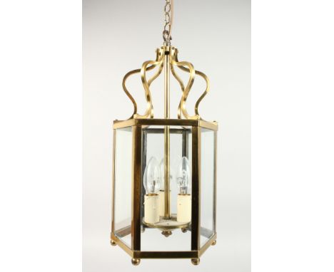 A BRASS OCTAGONAL HANGING LANTERN.