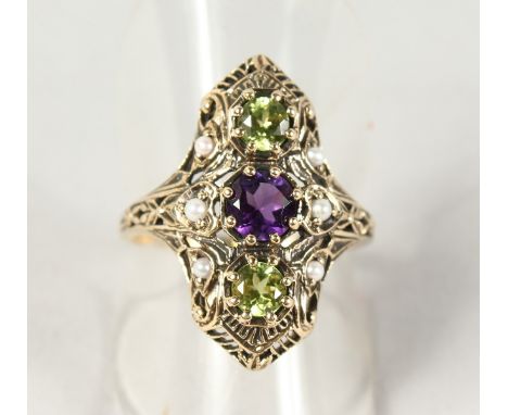 A SUPERB 9CT GOLD, PERIDOT, AMETHYST AND PEARL SUFFRAGETTE RING.