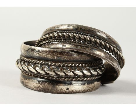 TWO ISLAMIC SILVER METAL BANGLES.