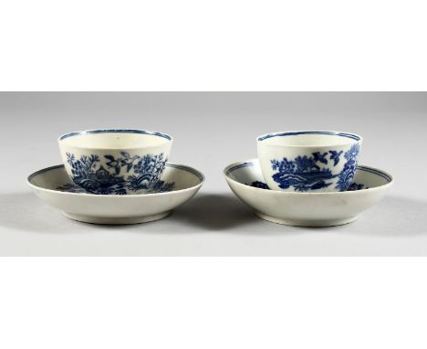 A SALOPIAN BLUE AND WHITE TEA BOWL AND SAUCER and A CAUGHLEY BLUE AND WHITE TEA BOWL AND SAUCER.