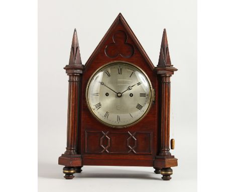 A 19TH CENTURY MAHOGANY MANTLE CLOCK, with eight day movement, the circular silvered dial signed Grimaldi &amp; Johnson, Stra