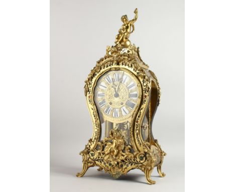 A 19TH CENTURY FRENCH "BOULLE" MANTLE CLOCK, with eight day movement, enamel numerals, the ormolu case mounted with a putti s