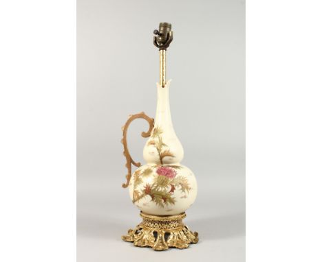 A DECORATED EWER SHAPED PORCELAIN AND GILT METAL MOUNTED LAMP BASE. 22ins high.