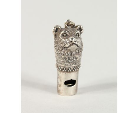 A CAST SILVER BEAR WHISTLE.