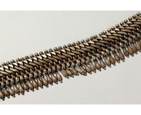 AN ISLAMIC SILVER METAL CHAIN.
