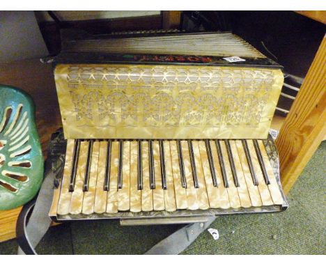 VINTAGE ACCORDIAN. Rosetti mother of pearl vintage piano accordian