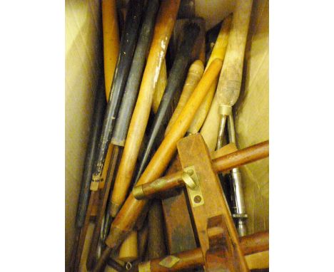VINTAGE WOODWORKING TOOLS. Box of vintage woodworking tools including chisels and planes