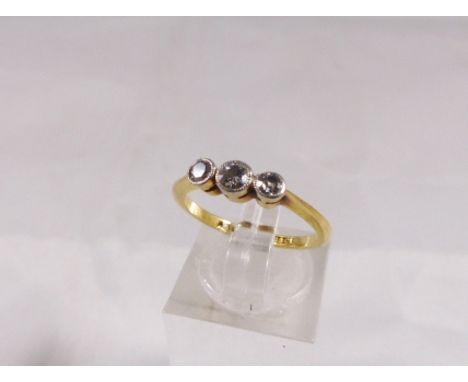 18CT DIAMOND RING. 18ct yellow gold three diamond set ring, 2.1g, size K