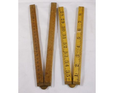 TWO PAIRS OF RULES. Two pairs of vintage folding rules 