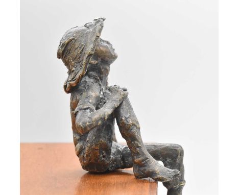 Unattributed; an interesting small bronze figure of a young boy wearing a hat. Height 20cm.