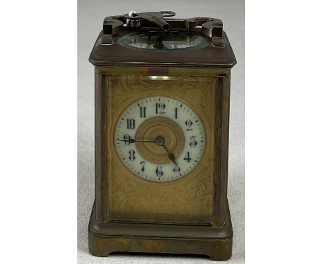 A 19th century brass carriage clock, with gilt and enamel face, together with the winding key, height 14cm.