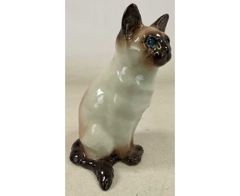 WINSTANLEY; a Siamese cat, in a sitting position, signed and marked to base no7, 33cm.Condition Report: Large crack in base