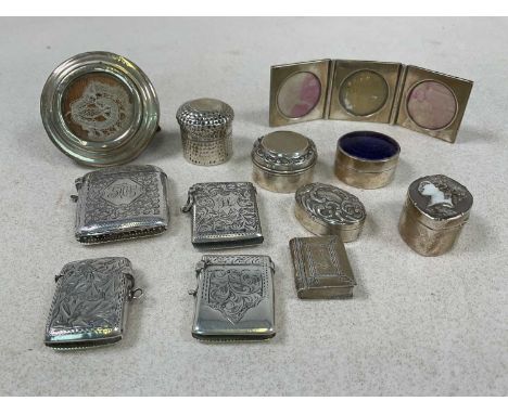 CARRINGTON &amp; CO; a George V hallmarked silver and silver gilt purple guilloché enamel decorated pill box, Birmingham 1911