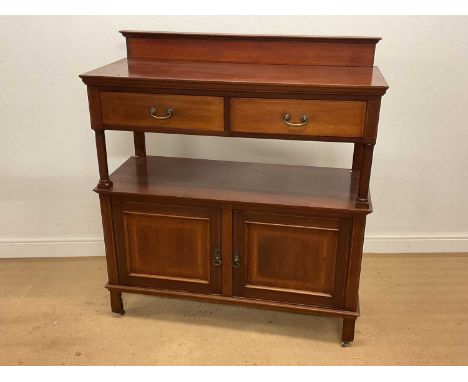 An Edwardian mahogany and inlaid buffet, the upper section with two drawers above a base of two cupboard doors, height 122cm,