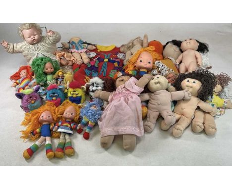 A group of dolls and teddies, to include four Furbies and six Cabbage Patch dolls, together with other dolls and toys from la