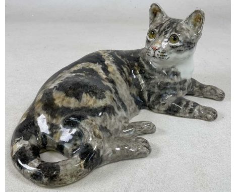 WINSTANLEY; a tabby cat, in a recumbent position, signed and marked no 7 to base, 18 x 42cm.Condition Report: No chips, crack