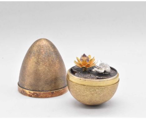 STUART DEVLIN; an Elizabeth II hallmarked silver gilt Easter egg, no. 16, hallmarked London 1972, in original box retailed by