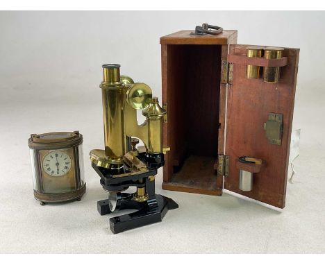 R &amp; J BECK LTD, LONDON; a brass and lacquer monocular microscope with a mahogany fitted case and additional lenses, case 