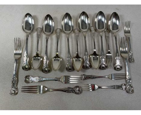 A 19th century Scottish composite canteen of hallmarked silver Queens pattern flatware, each piece with engraved crest inscri