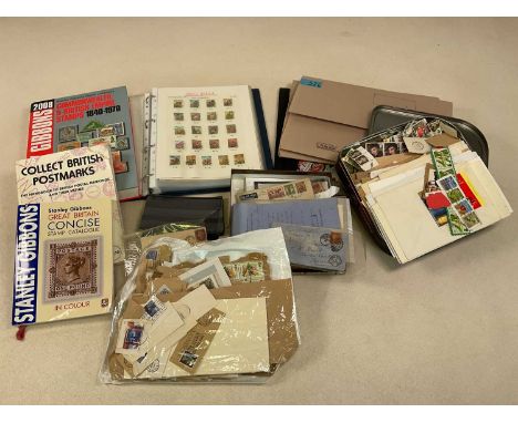 STAMPS; a collection of British and Commonwealth stamps, with some early examples including a penny red, together with books 