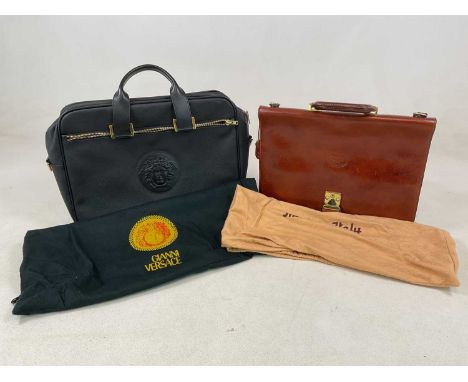 An Italian tan leather briefcase and a Versace style holdall. (2)