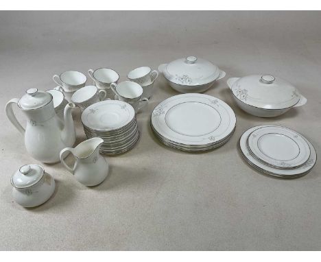 ROYAL DOULTON; a dinner service and coffee set in 'Mystique' pattern, comprising twelve cups and saucers, a coffee pot, sugar