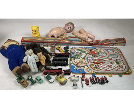 A quantity of 1960s toys and teddy bears, to include a teddy in a blue knitted outfit with bells and a growler, bisque headed