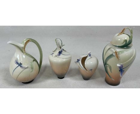 FRANZ PORCELAIN; a pitcher, two vases, and a ginger jar, numbers 00766, 00188,00189 and 01268, tallest 24cm, all with boxes (
