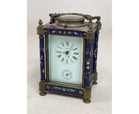A large brass cloisonné enamel decorated repeating carriage clock, the rectangular white enamel dial inscribed 'M. F. E', abo