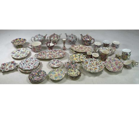 A quantity of chintz patterned ceramics to include cups and saucers, plates etc