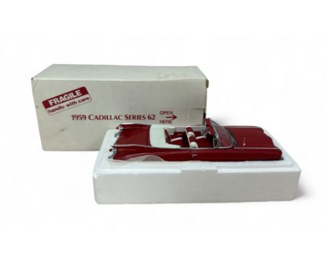 Danbury Mint 1/24th scale 1959 Cadillac Series 62 red with off white/red interior and hood down, generally excellent in good 