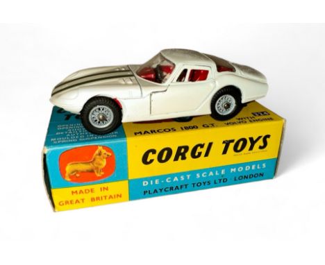 Corgi Marcos 1800 GT No. 324, white, red interior, racing driver figure, green stripes to bonnet, wire wheel-style hubs, unap