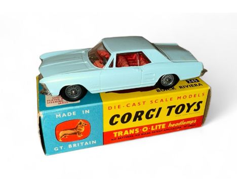 Corgi Buick Riviera No. 245, pale blue, red interior, tow bar, wire wheel-style hubs and folded leaflet, generally excellent 