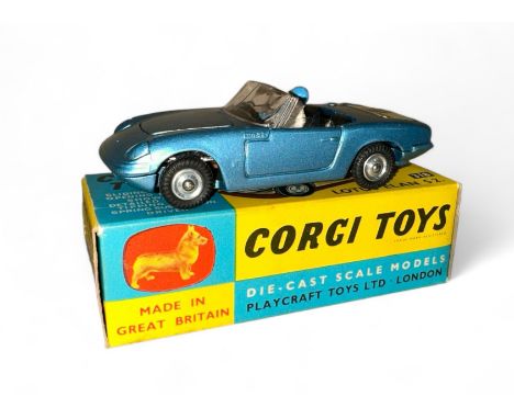 Corgi Lotus Elan S2 No. 318, metallic blue, black interior, side windows, tan lower dashboard, "Tiger" boot decal, plastic ra