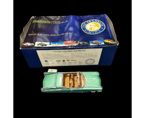 Franklin Mint 1/24th scale 1959 Cadillac Eldorado Biarritz metallic green with tan interior No. B11E028, generally excellent 
