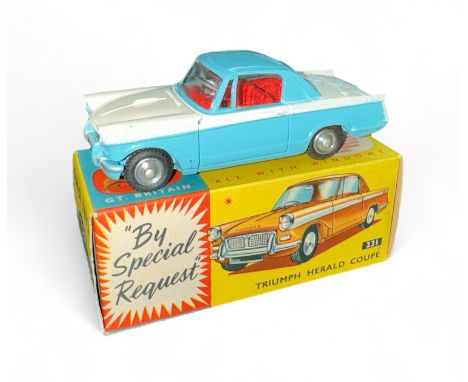 Corgi Triumph Herald No. 231, two-tone pale blue and white, generally excellent in good plus blue and yellow box (pencil mark
