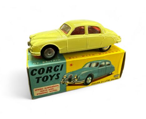 Corgi Jaguar 2.4 Litre No. 208S, primrose with red interior, flat spun hubs and folded leaflet, generally excellent in good p