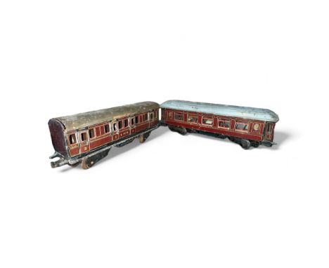 Marklin O gauge pair of LMS bogie coaches, generally good to good fair, with one with seats and tables inside (roof unattache