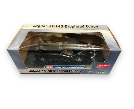 Sun Star 1/18th scale Jaguar XK140 Drophead Coupe No. 3203, black with black hood (raised), generally excellent (fitted to in