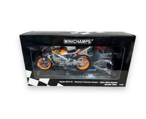 Minichamps 1/12th scale Honda RC211V 2006 N Hayden No. 122 061069, generally excellent in excellent window box including inne