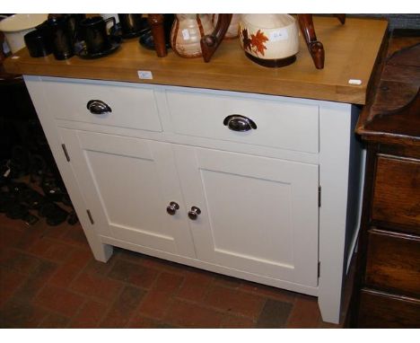 A contemporary light oak and painted wood side cabinet with two drawers and cupboard below - width 100cms