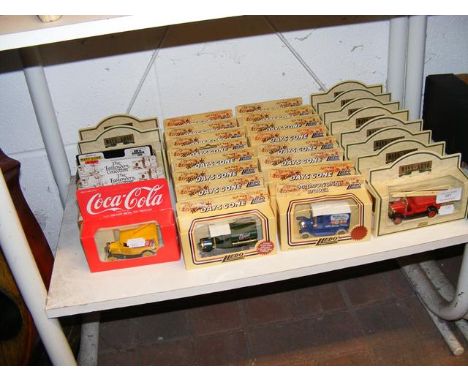 A quantity of die cast model vehicles in boxes 