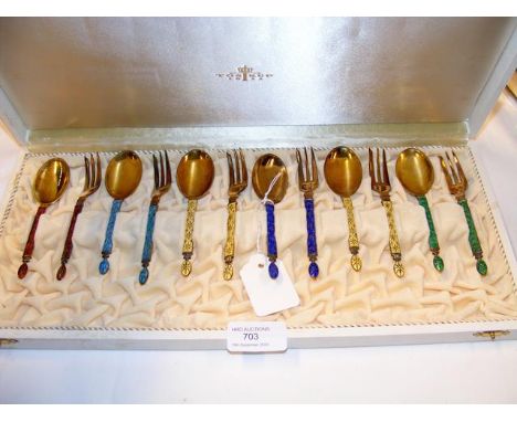 A set of Norwegian sterling silver and enamel spoon and fork set CONDITION REPORT small chip to yellow enamel spoon - no sign
