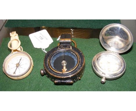 A 1918 military compass in plated case by Haseler & Sons, Birmingham, together with two others 