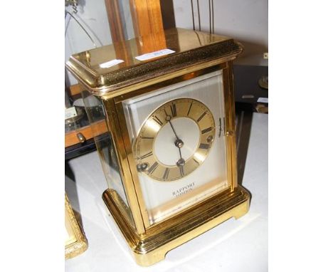 A 25cm high four glass mantel clock by Rapport of London