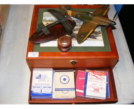 A cabinet containing a quantity of mainly US book match covers, two model aircraft, etc. 