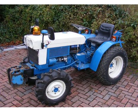 A 1982 Mitsubishi diesel compact agricultural tractor, 4 X 4 - with paperwork and V5 -  registration number ABW 729XCONDITION