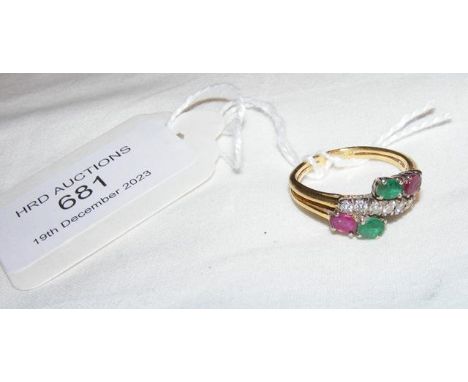 A diamond, ruby and emerald ring in 18ct setting