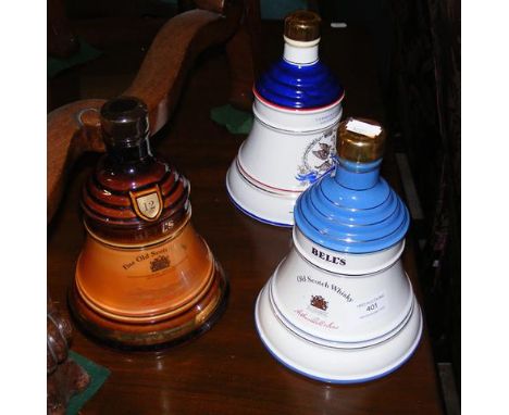 Three unopened Bell's Scotch Whiskey decanters 