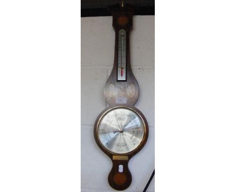 A wall barometer and thermometer by Comitti of London 